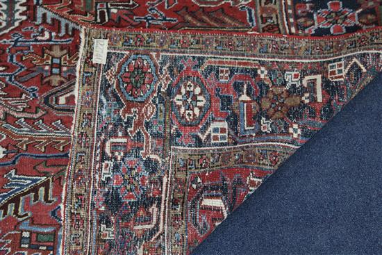 A Persian rug, 11ft 4in by 7ft 11in.